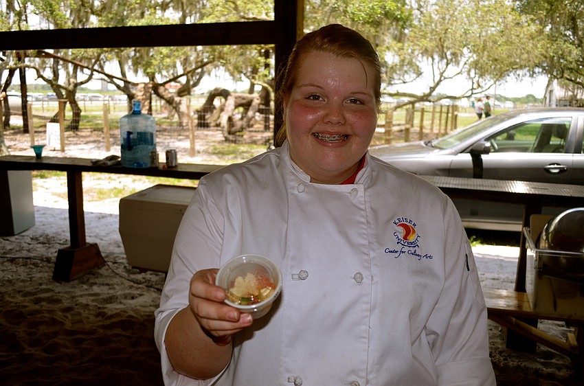 Keiser University students, such as Danielle Paschky, provide cooking demonstrations.