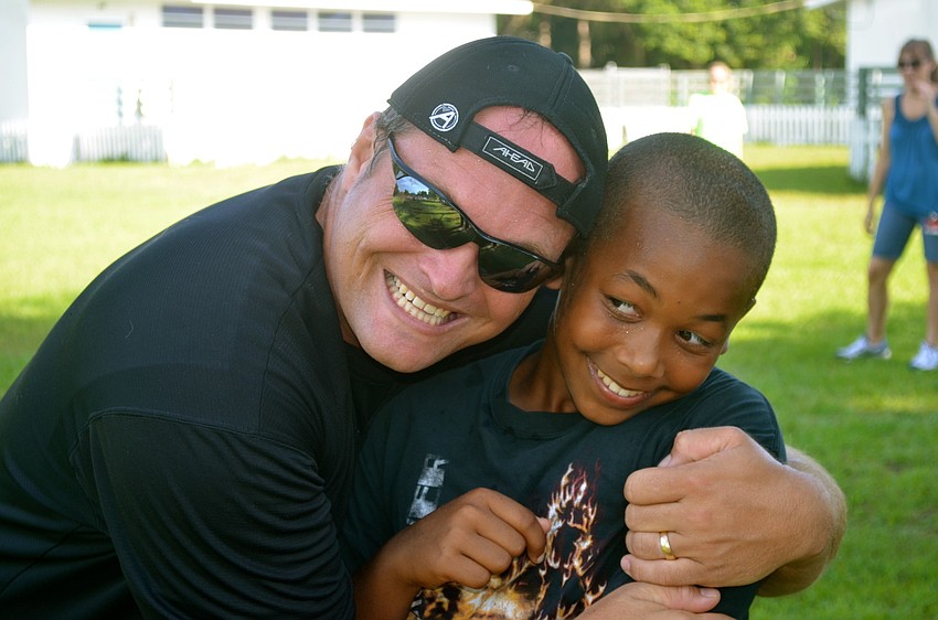 Chuck Rogalla and Ezra Mason share laughs during the game.