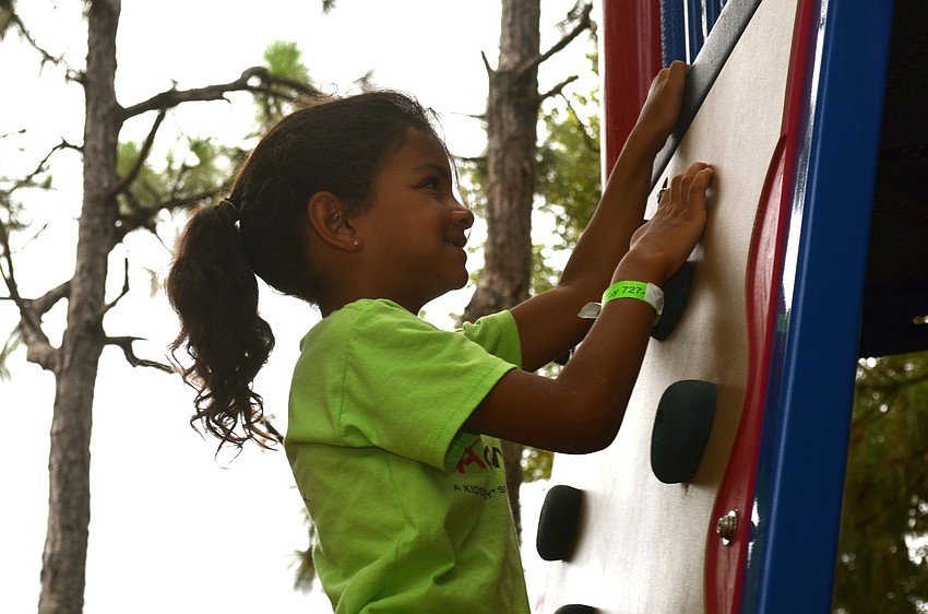 Dereon Lovette climbs to the top.