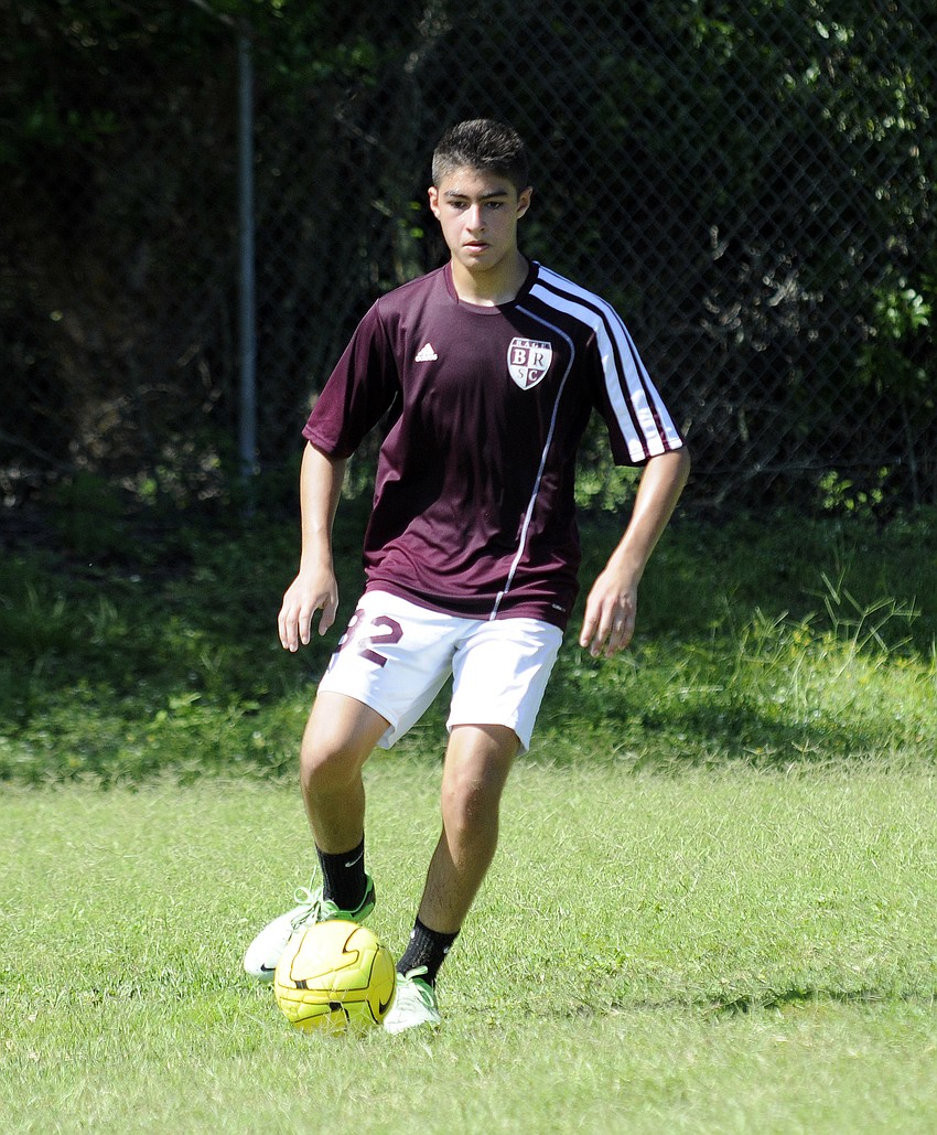 Lakewood Ranch High freshman Tav Ortiz dribbles the ball during a shooting drill.