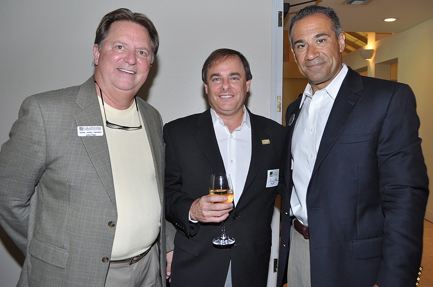 John Fain, Bruce McDonald and The Resort at Longboat Key Club general manager and event host Jeff Mayers