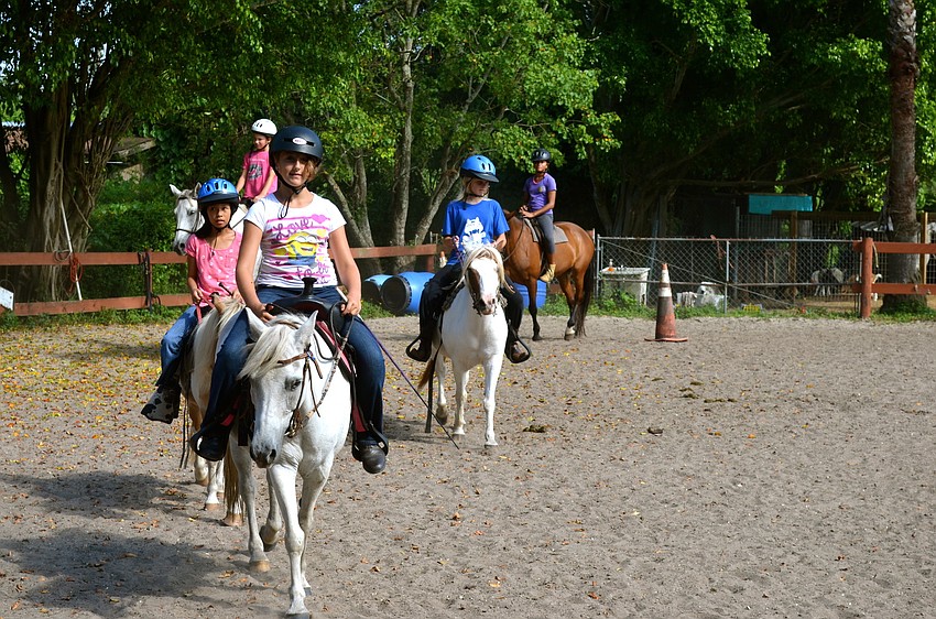 Children ages 6 through 15 enjoy nine weeks of horseback riding.