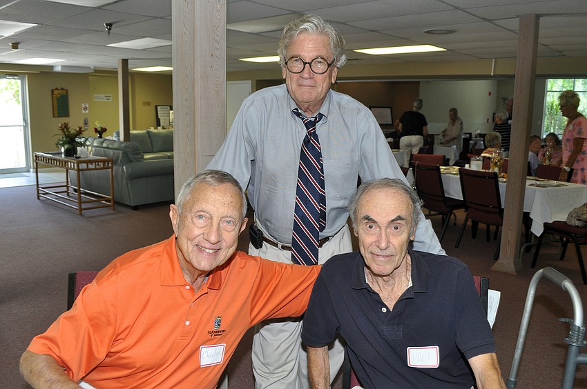 Charlie Shook, the Rev. Vince Carroll and Paul Achre