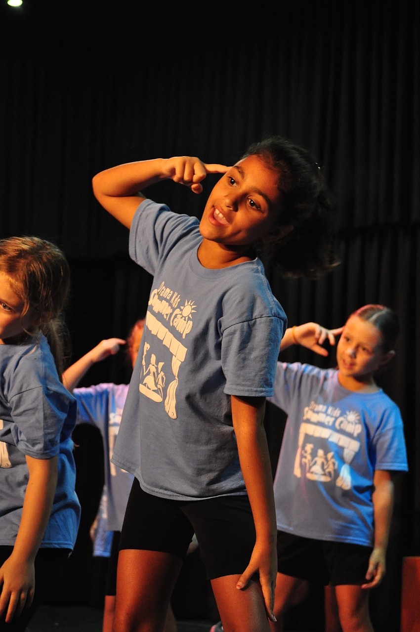 Freedom Elementary School's Maya Dreyfus performs to the song 