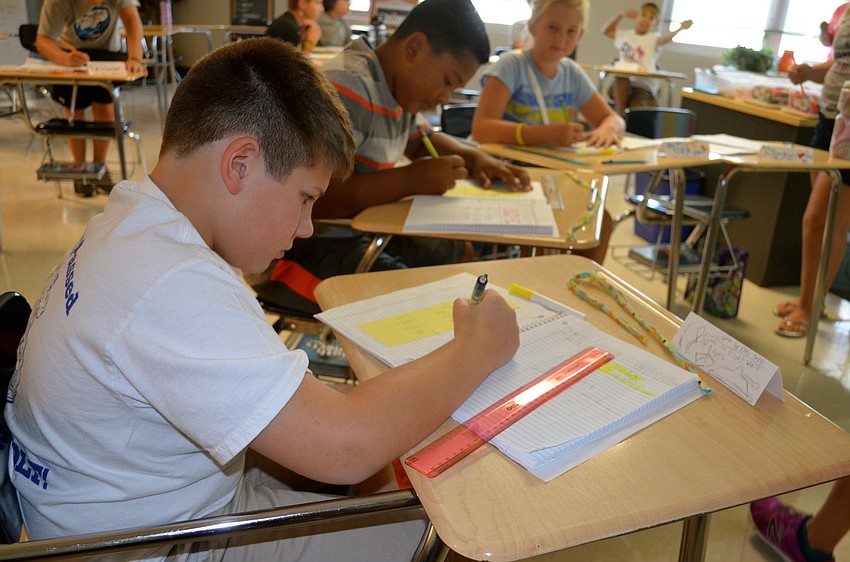 Nick Spade works to solve a math problem as quickly as he can.