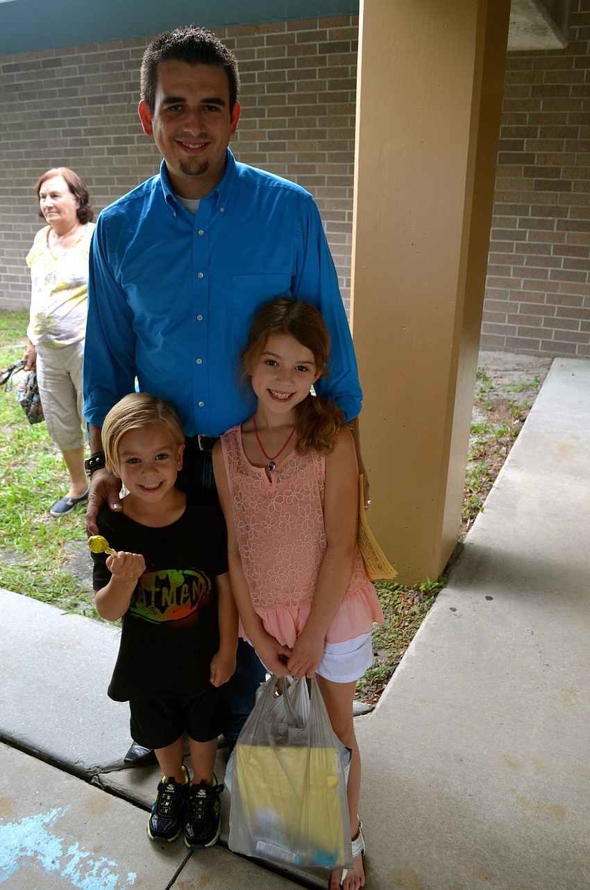 The Wilson family â€” Ragan, David and Kelsey.