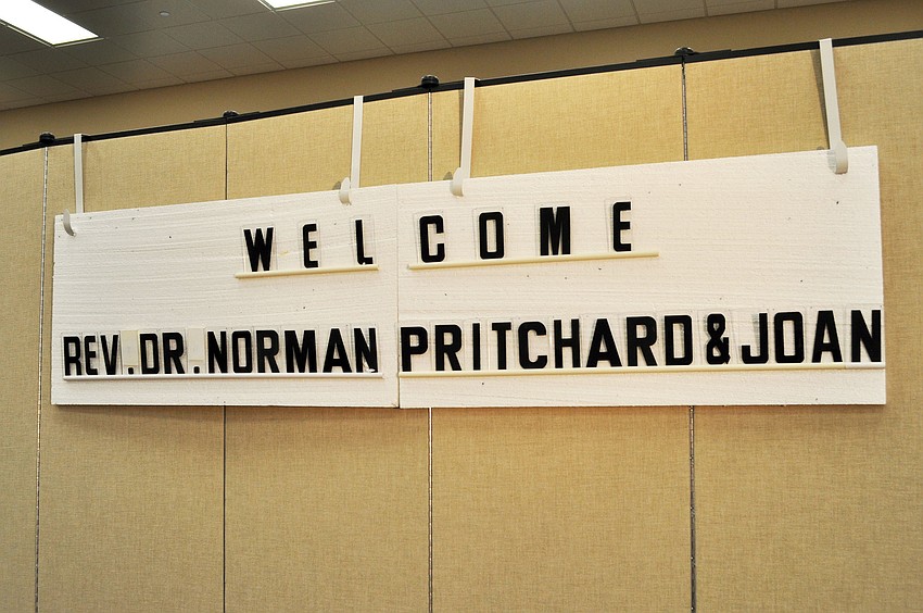 Christ Church members welcome the Rev. Dr. Norman Pritchard and his wife Joan at the annual summer barbecue dinner Friday, Aug. 15.