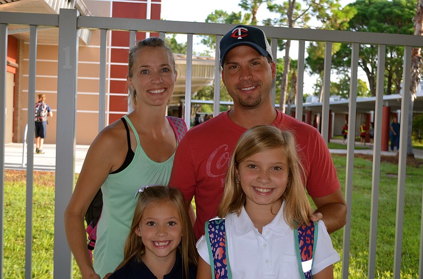 Arianne and Mike Austen drop off their daughters Taylor and Lindsay.