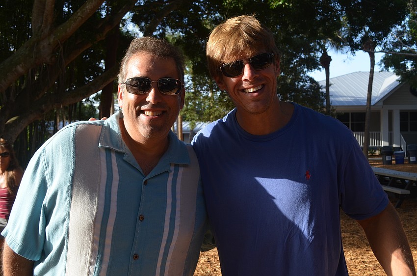 Jeff Cusumano and Steven Seymour have coffee after dropping off their children.