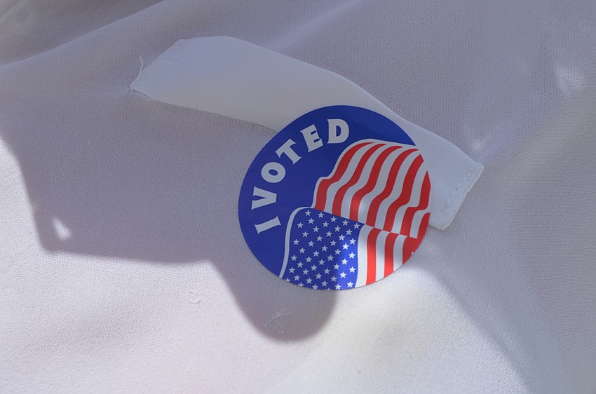 Voters receive a sticker.
