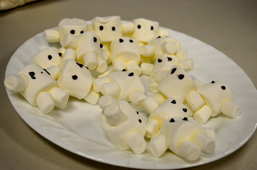 Attendees snack on show-themed treats.