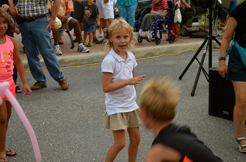 Michelle Wagner dances to the music.
