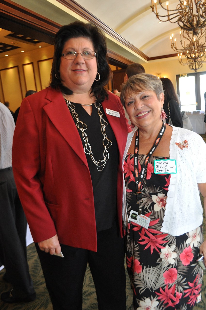 Joni Rametta, of Nepsis, with Marta Belle, of ServPro