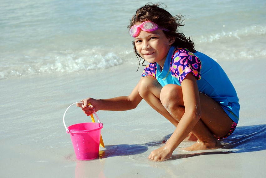 Bree Huitema plays in the sand.