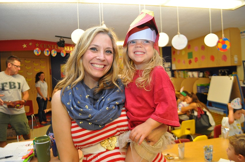 Denise West visits her daughter Kylie, representing China, before visiting her son, Kayden, who represented Colombia.