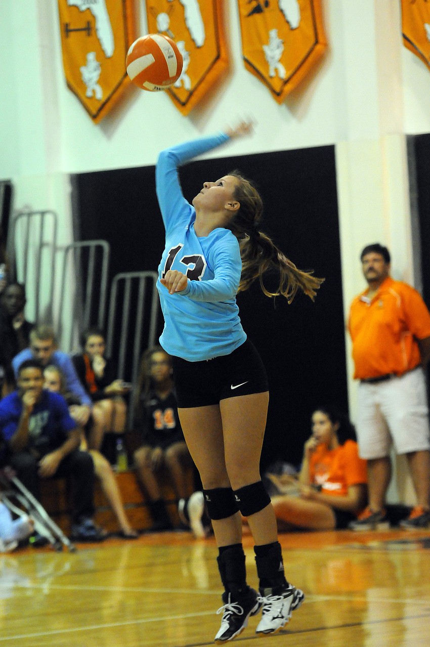 Riverview libero Sam Norden serves the ball during the first set.