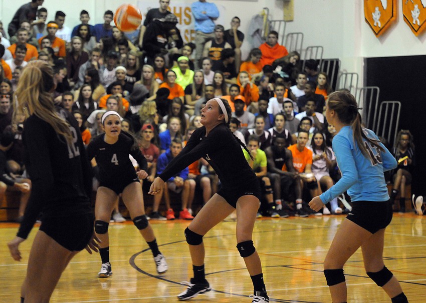 Riverview sophomore Margo Schapf records a dig for the Lady Rams.