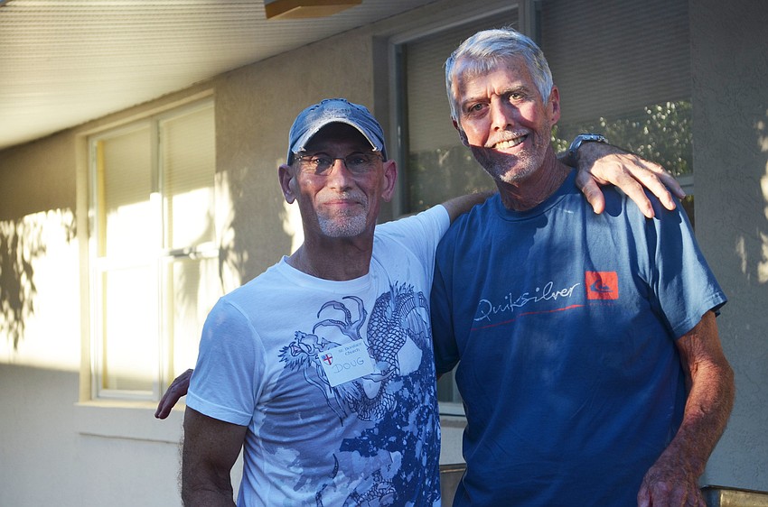 Senior Warden, Doug Francis and Junior Warden, Vince Brennan helped serve guests at the St. Boniface Parish Cookout.