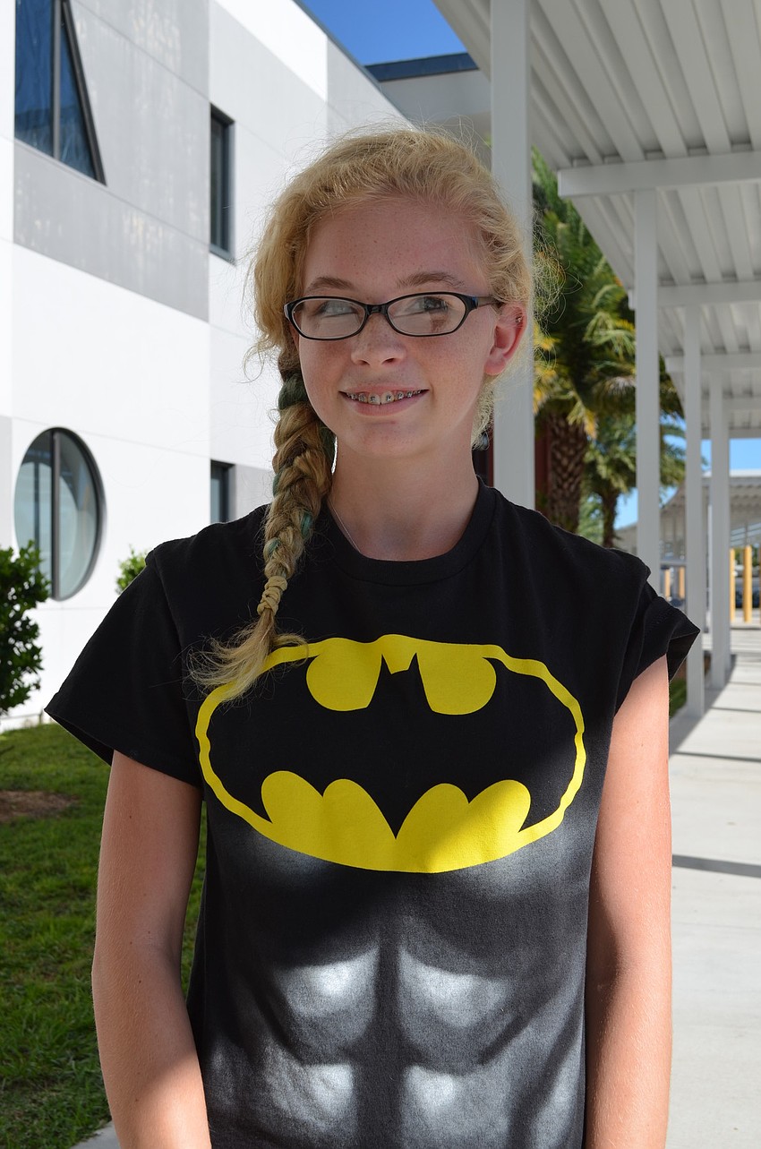 Freshman Shely Mack dressed as Batman for superhero day.