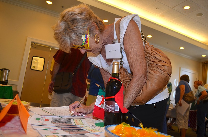 Darlene Stewart signs up to be a member of the Lakewood Ranch Italian Club.