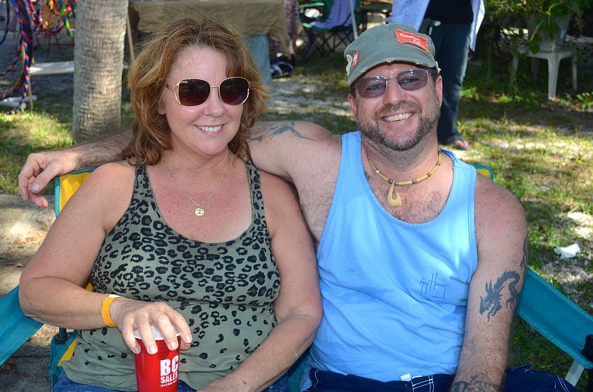 Erin and Mitch Shrimpton stay cool in the shade.