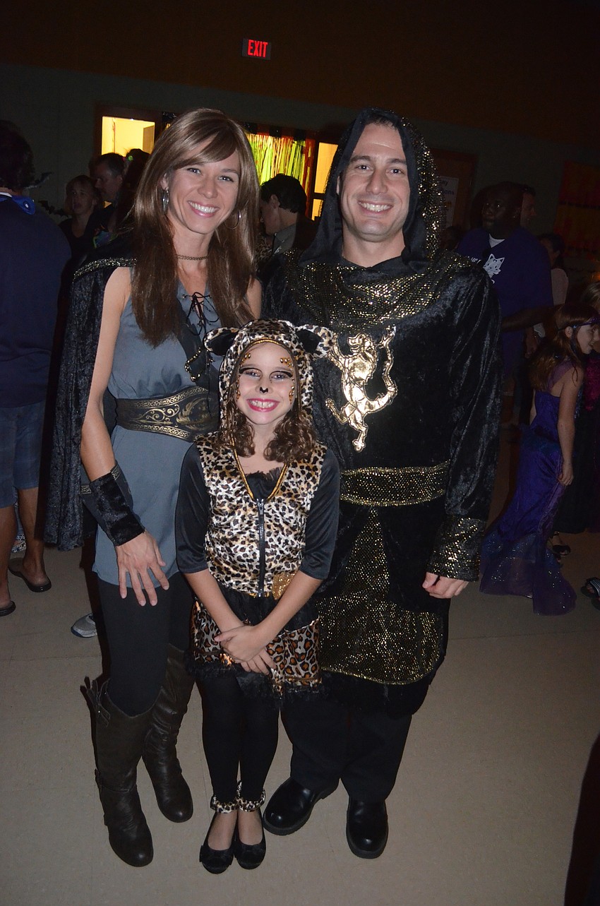 The Bennett family â€” Rachel, Bruce and Rylee â€” dress for the occasion.