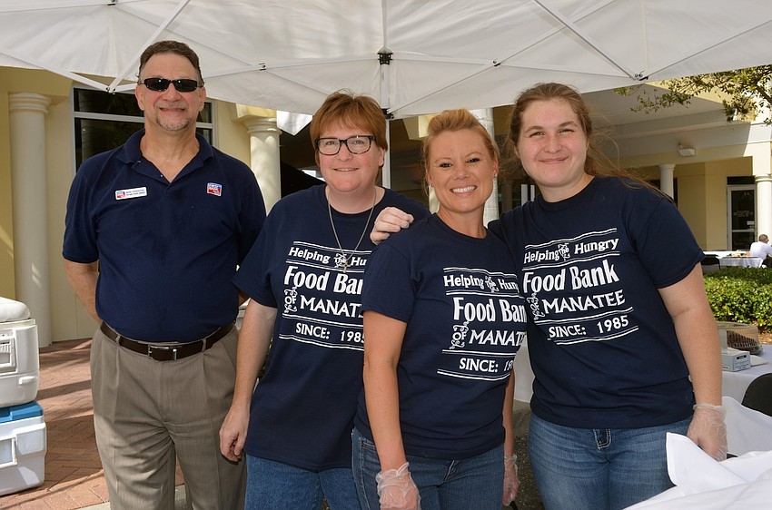 Mark Rosenthal, Kerry Ford, Jessica Cary and Alura Comstock volunteer at the event.