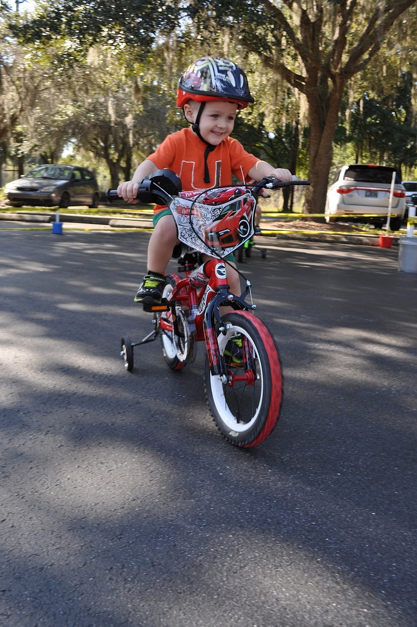 Everett Hartley, 3, can't stop smiling.