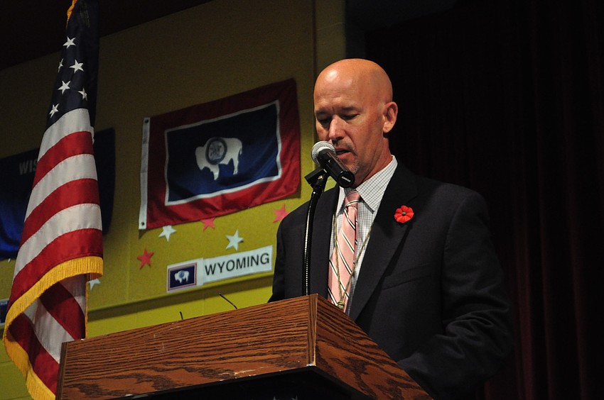Freedom Principal Jim Mennes welcomes guests.