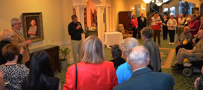 Overall-Guests toasted to the unveiling of the portrait of Mary Fran Carroll.