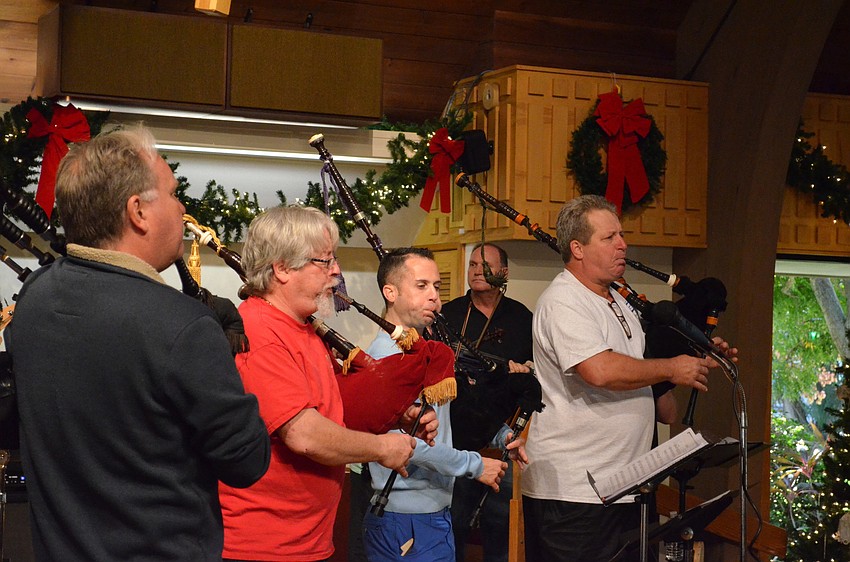Kevin Oâ€™Neil, Larry Jacobs, Ross Allen and Gary Reinstrom lead the band through a rendition of traditional Scottish songs