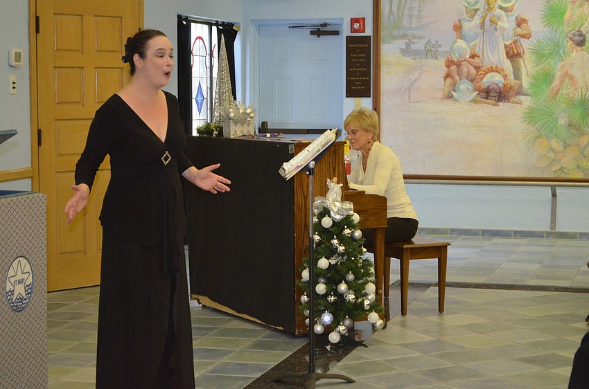 Michelle Giglio, accompanied by Lee Dougherty Ross, sings arias and Christmas carols.