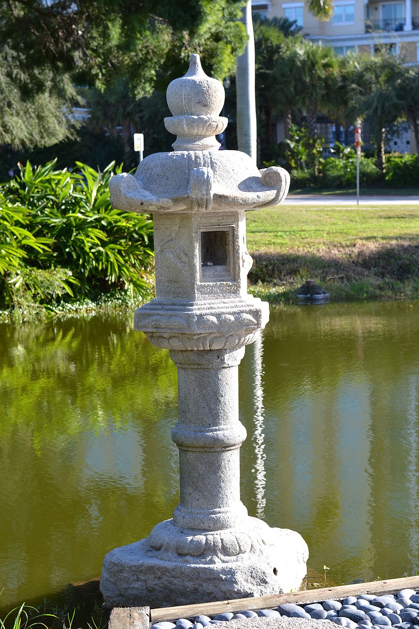 The historic Japanese lantern is standing at the Sarasota Garden Club Center once more after months of restoration.