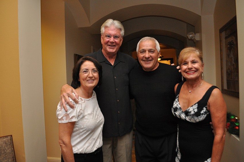 Kathy and Bill Vernal catch up with Tony and Pauline Tierno.