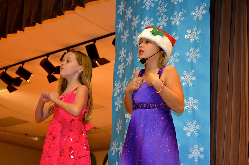 Gracie Oldham and Berkeley Brown are narrators for the play.