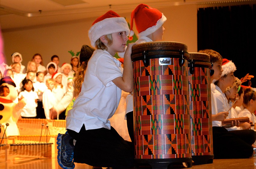 Alec Henderson waits for his turn to play his drum.
