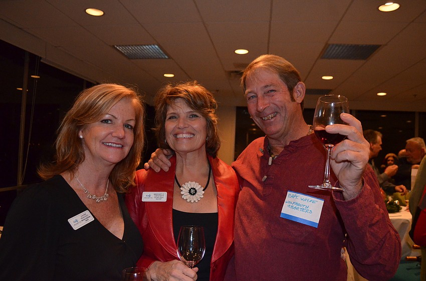 Laurie Francey and Bridget Gennett, of Jeanette Properties, and Wayne Genthner, of Wolfmouth Charters