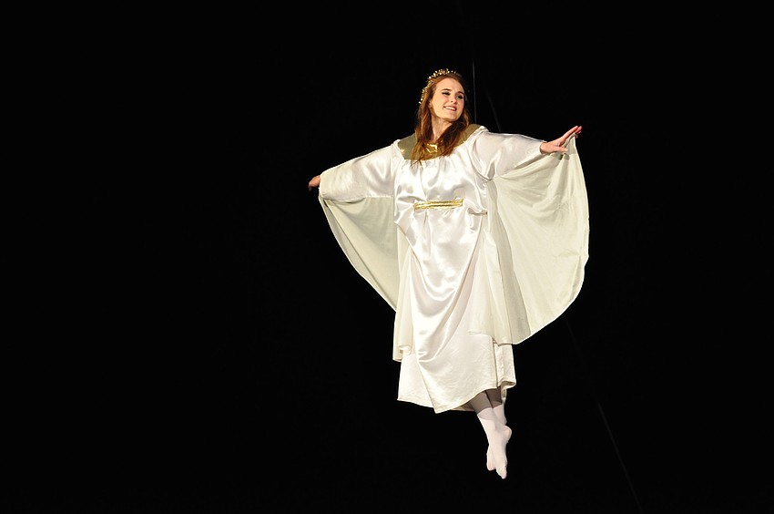 An angel, played by Christina Goodwin, announces the birth of Jesus.