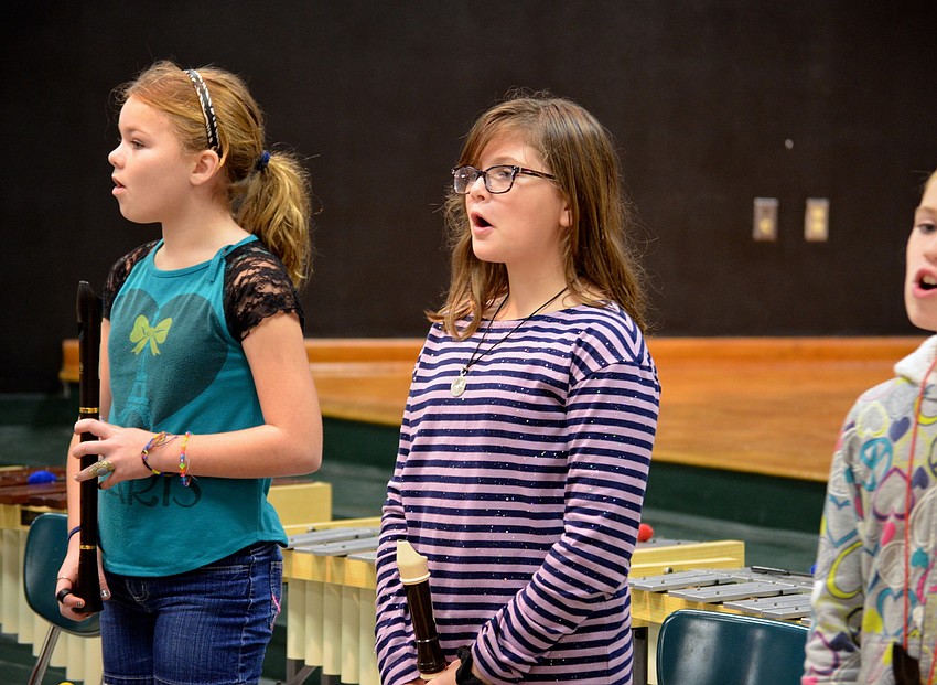 Alexis Hamilton sings Christmas carols.