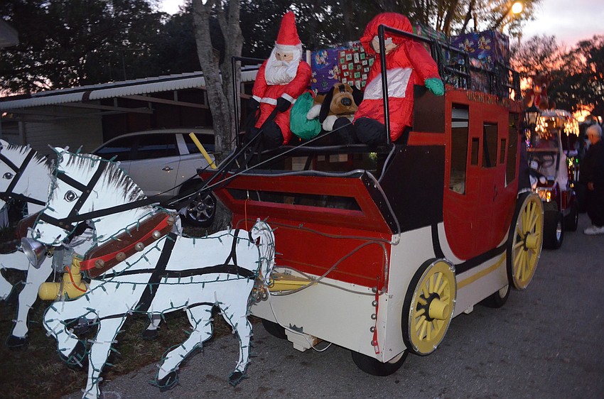 The horse drawn carriage is among the parade's oldest carts.