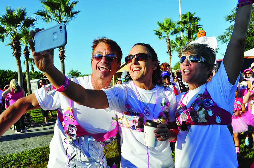 Charlie Coury, Virginie Breuer and Doreen Karras, of Tropicana's team, create a video of themselves and the rest of their team to share with Sandi 