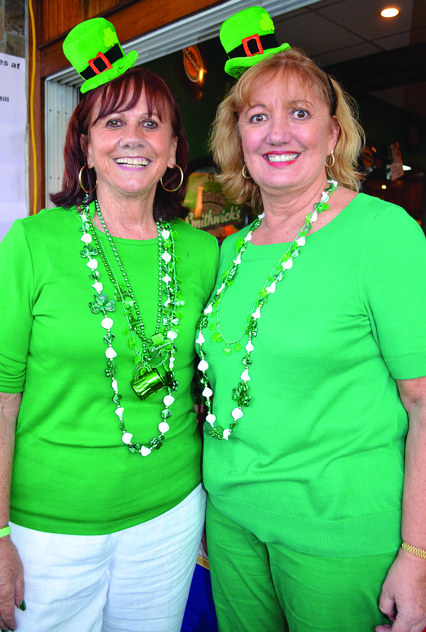 Lynches Pub & Grub owners Ethna and Chris Lynch keep the green beer flowing and the bagpipes playing March 17, during the restaurantâ€™s St. Patrick's Day celebration.
