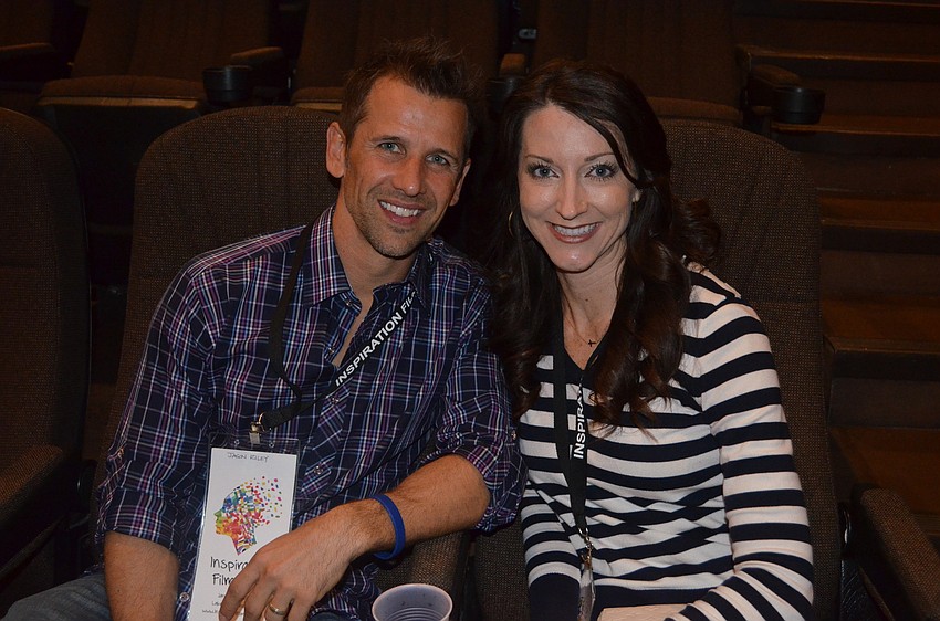 Jason and Carrie Riley wait for guest speaker Lawrence Gilliard Jr. to answer the audience's questions.