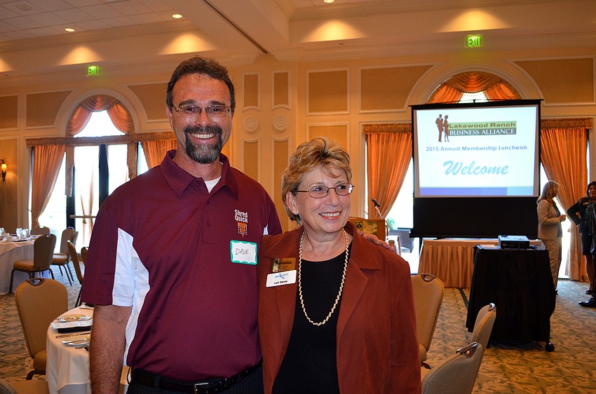 Dave Stanton and Lori Denny share stories.