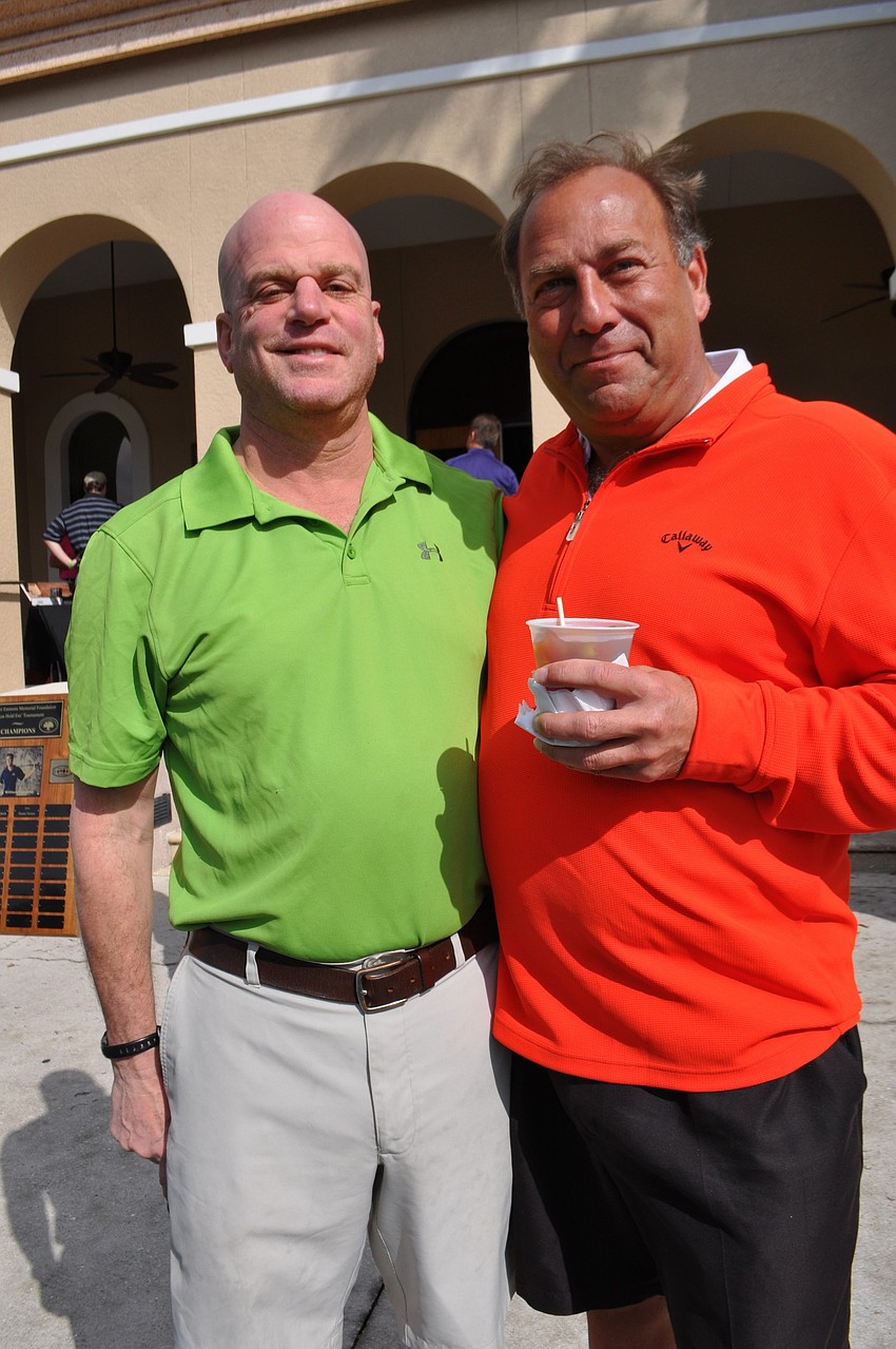 Marc Weiss and Steve Neff are eager to hit the golf course.
