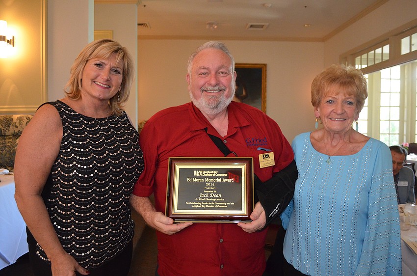 Jan Jordan, left, and Marge Moran, right, pose with Jack Dean, winner of the Ed Moran Memorial Award. The award is given to those who exhibit exceptional service to the community and the Chamber.