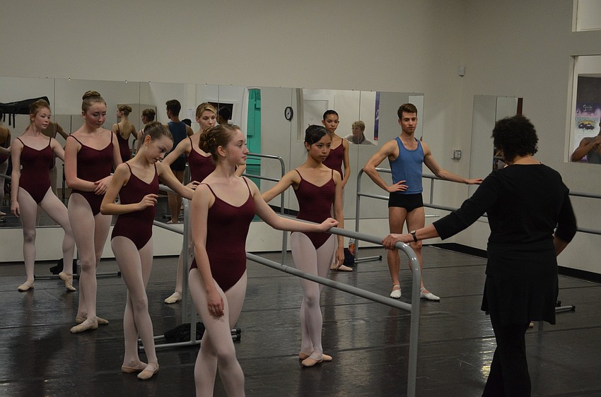 Virginia Johnson addressing the students at the barre.