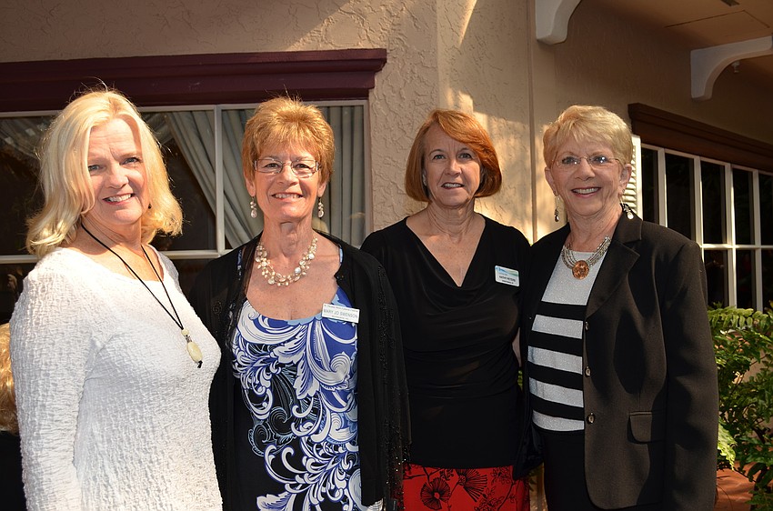 Model Rita Champlin with Mary Jo Swenson and models Kathy Peters and Marlene Wagner.