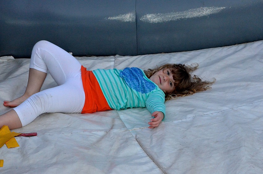 Paulina Whyte tests the inflatable slide.