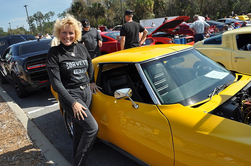 MTC employee Valerie Viands shows off her 1975 Stingray Corvette.